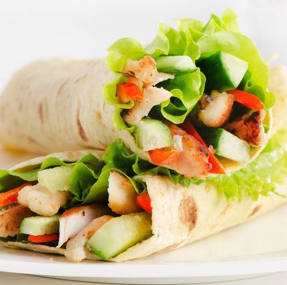 18721644 tortilla wraps with chicken and fresh vegetables